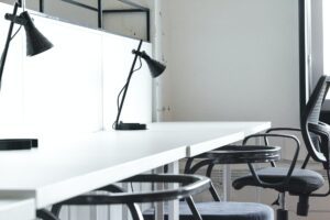 Morning in coworking. Contemporary office interior with furniture